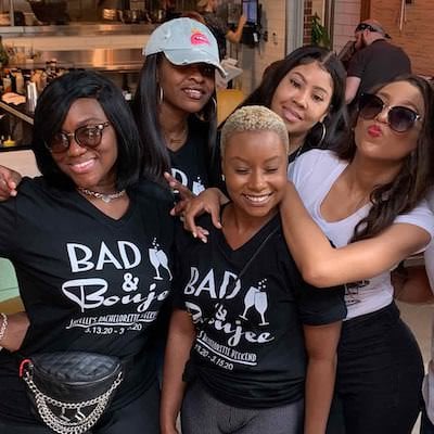 Bachelorette party wearing matching shirts during a scavenger hunt stop