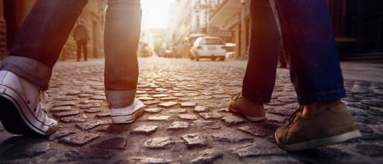 Friends taking a challenge photo on a ghost tour scavenger hunt